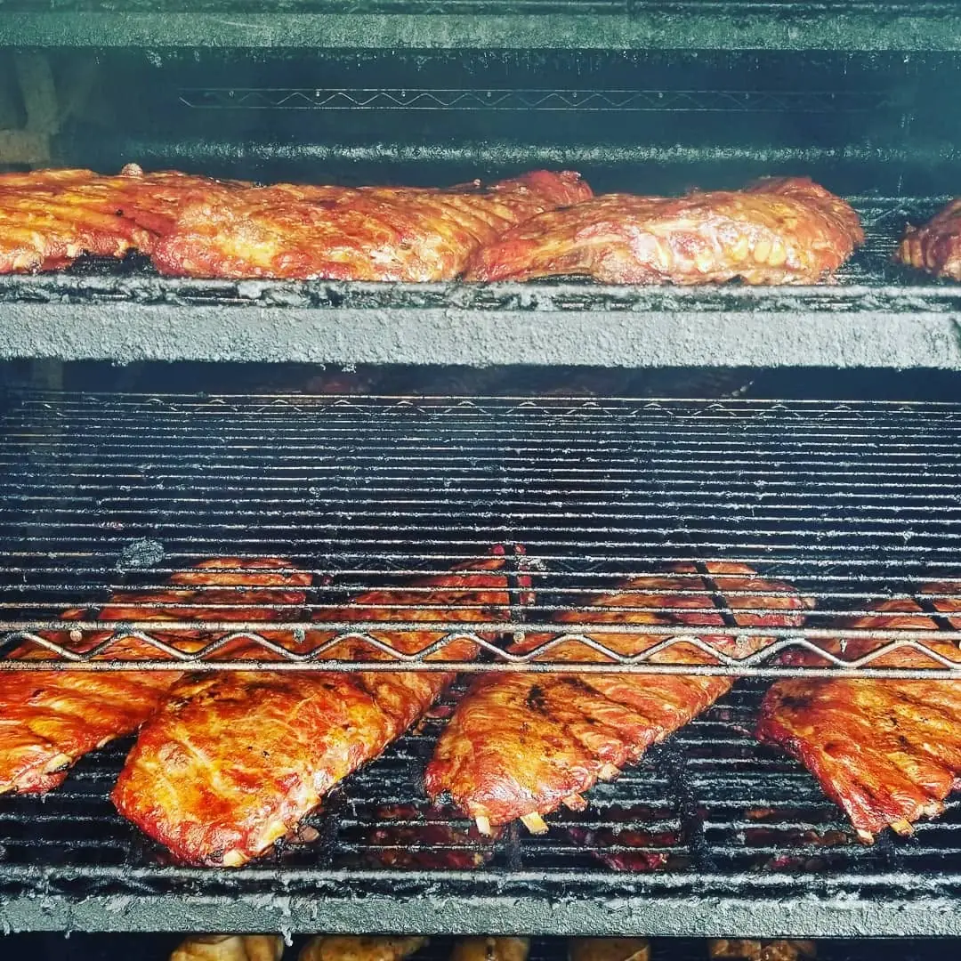 Pork ribs cooking on the grill